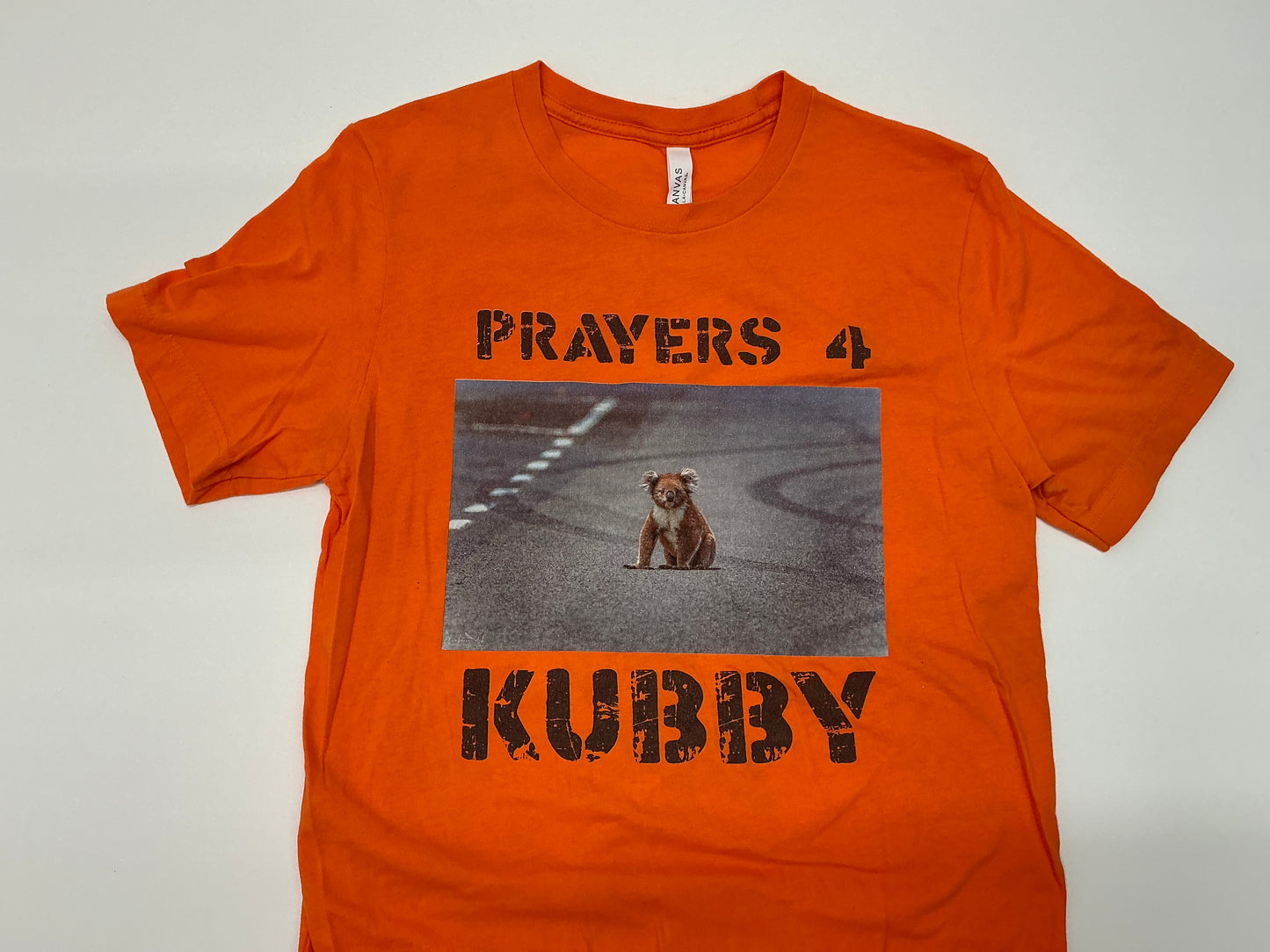 We Are All Kubby T-Shirts S1E7 Woke (2020-2022) Movie Prop Y'allywood Props Prayers 4 Kubby Orange Medium