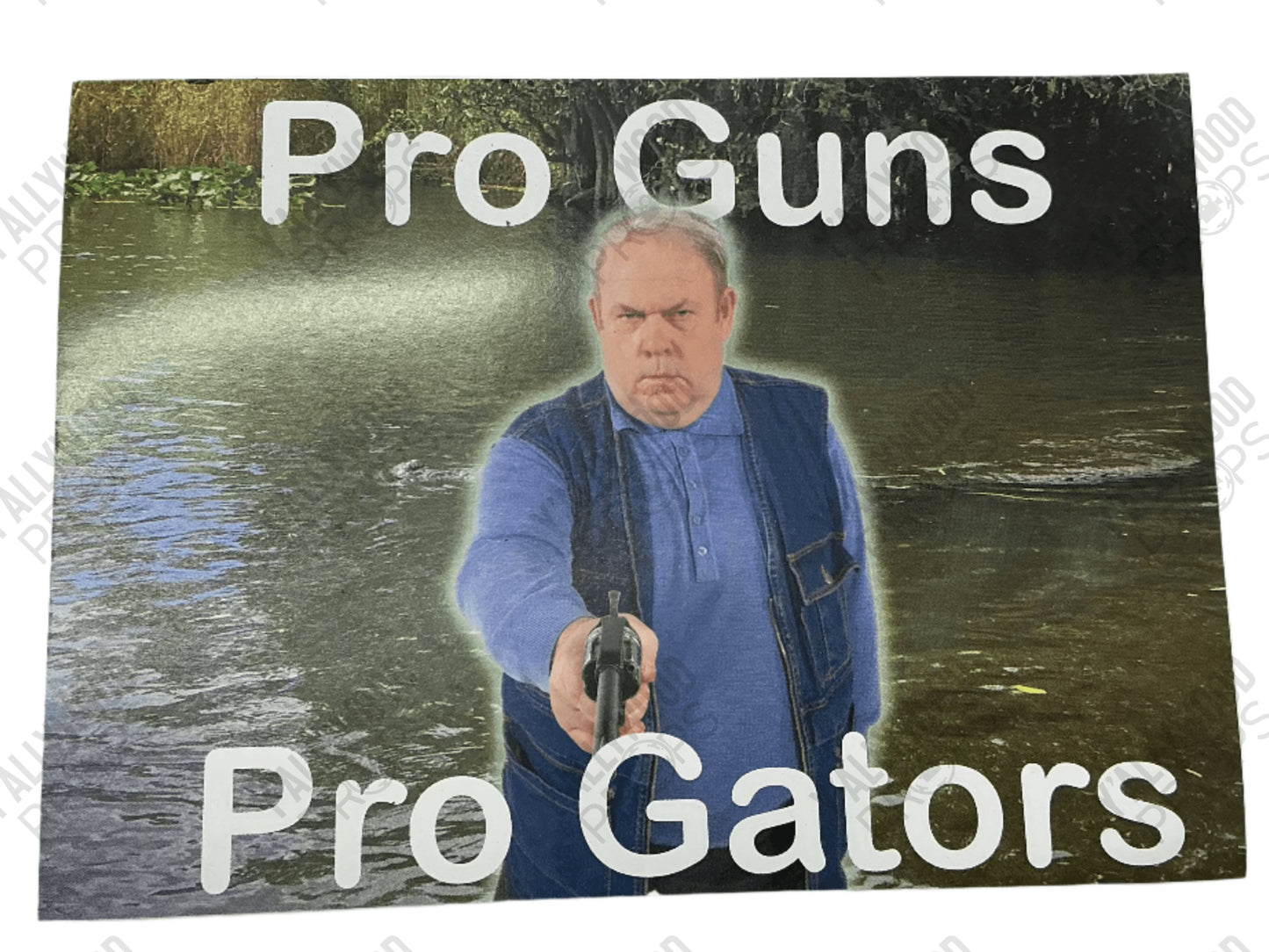 Postcard featuring man in blue shirt holding gun in front of water background with "Pro Guns Pro Gators" text.