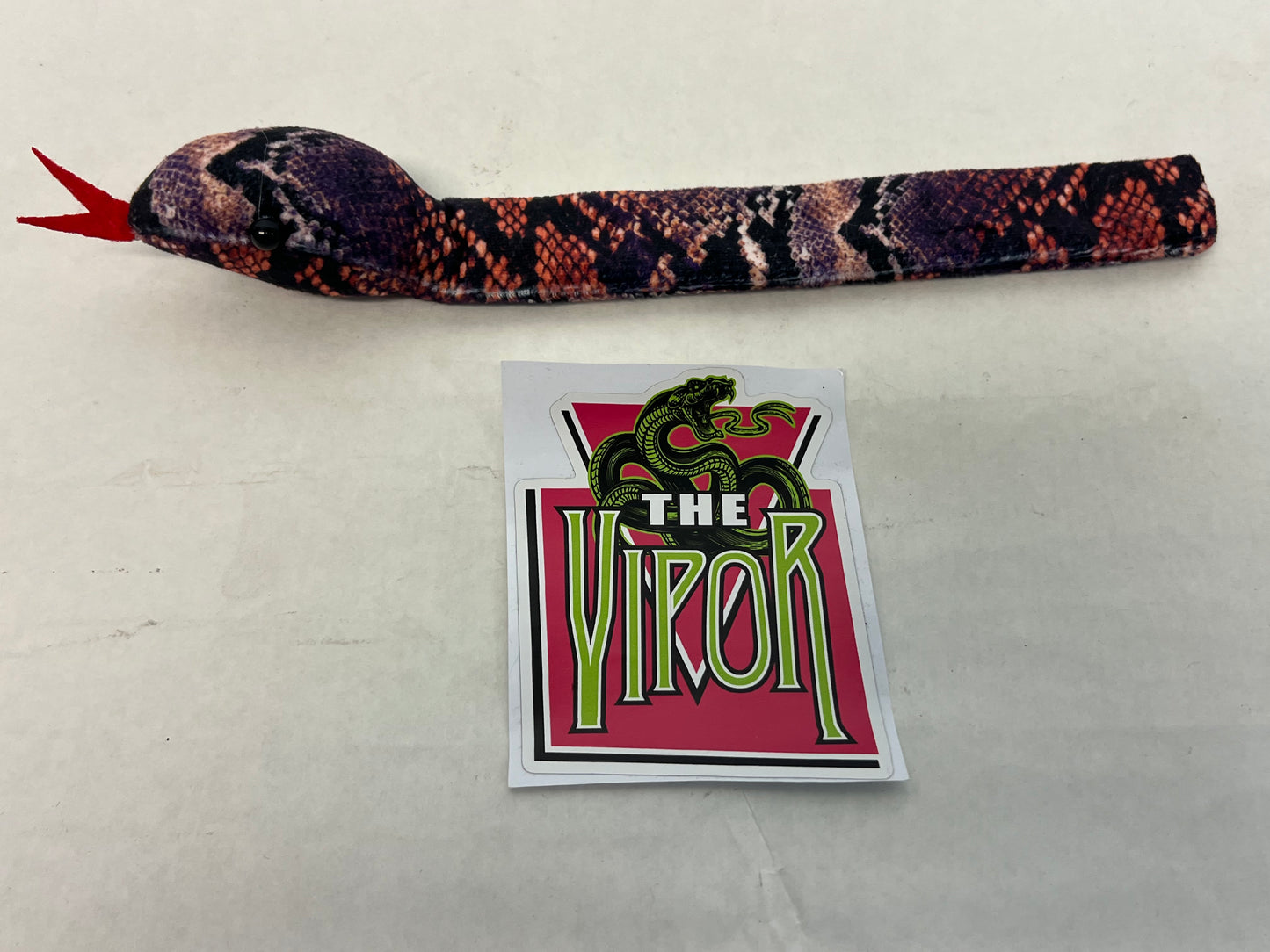 The Vipor Merch S2E4 Heels (2021) Movie Prop Atlanta Brick Co Purple slap bracelet w/sticker  