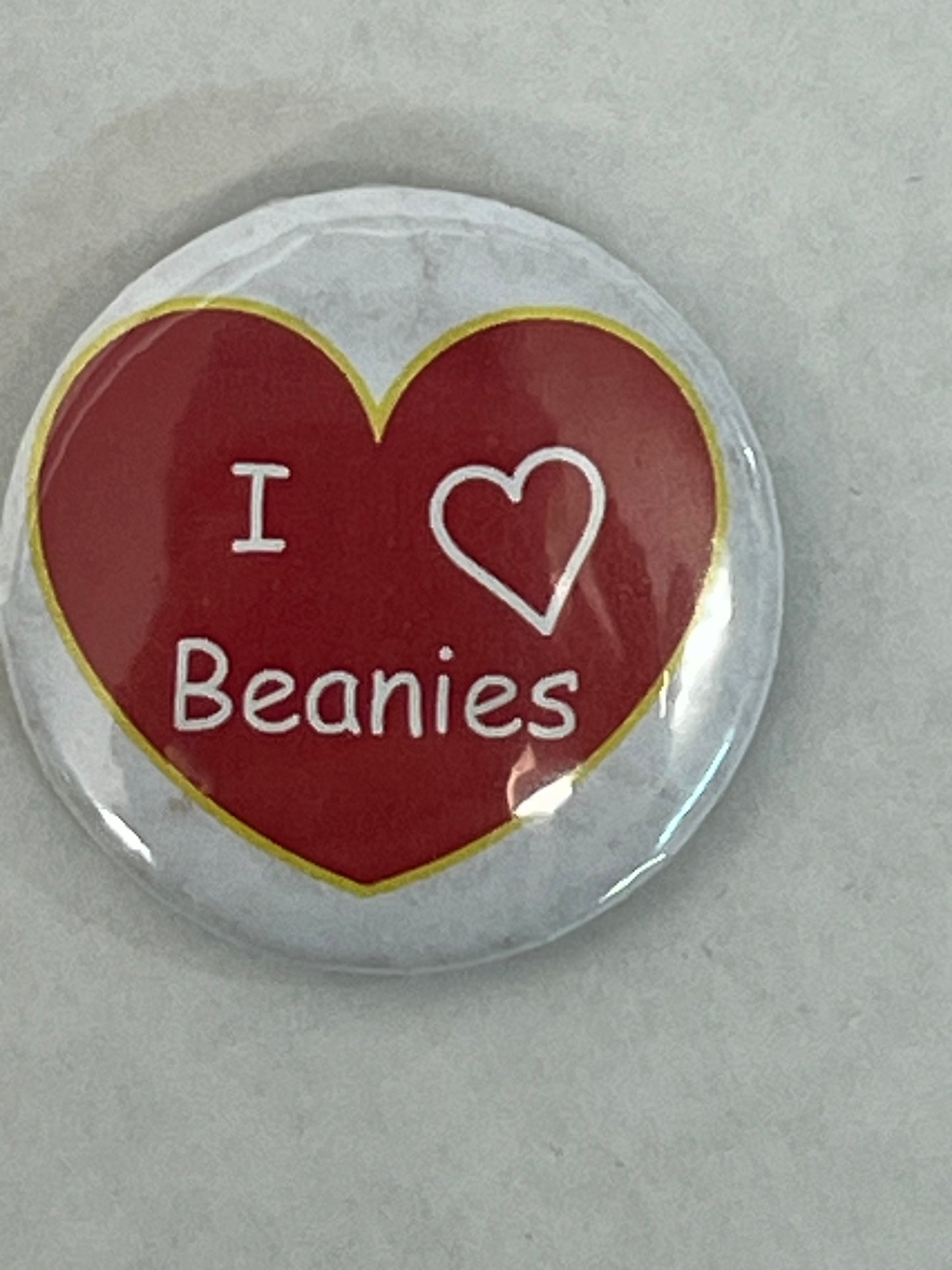 Linda's Buttons The Beanie Bubble (2023) Movie Prop Y'allywood Props I Heart Beanies