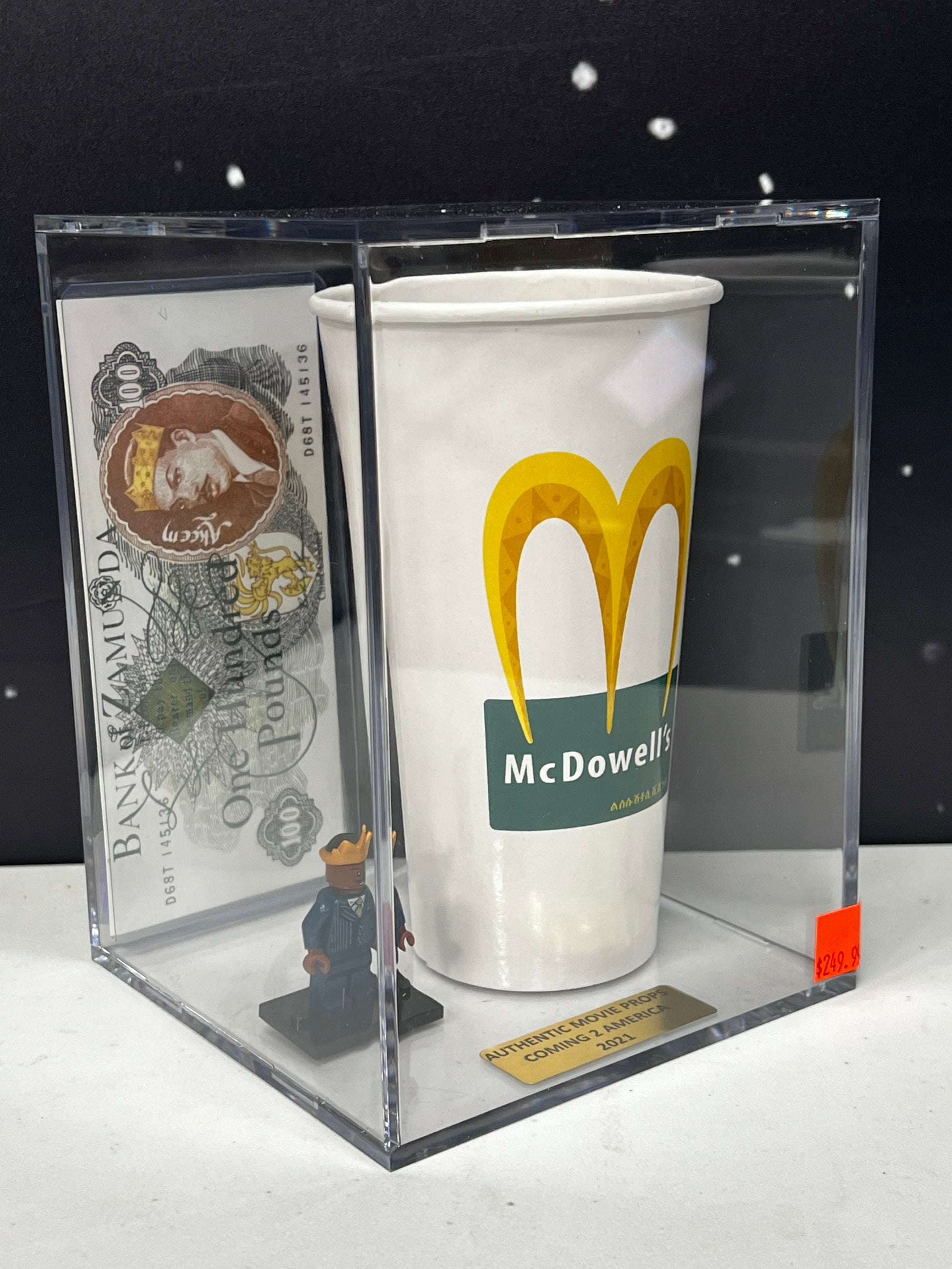 Bank of Zamunda 100 Pound Note and McDowell's Cup, from Coming 2 America Movie Prop Y'allywood Props   