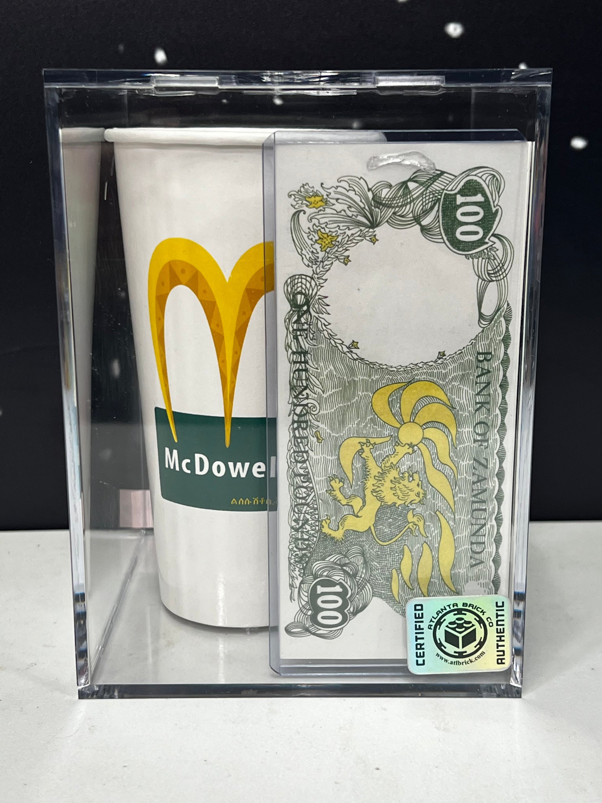 Bank of Zamunda 100 Pound Note and McDowell's Cup, from Coming 2 America Movie Prop Y'allywood Props   